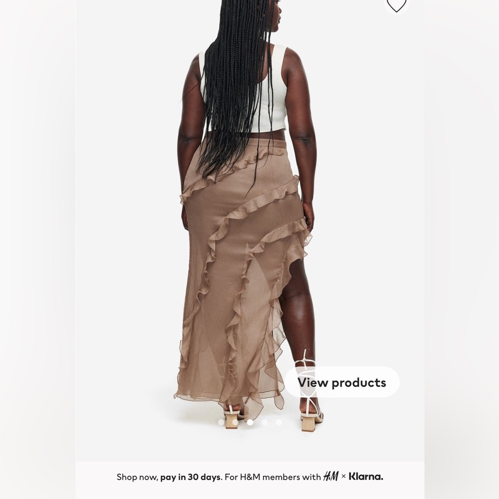H&M long skirt , color brown, never worn.